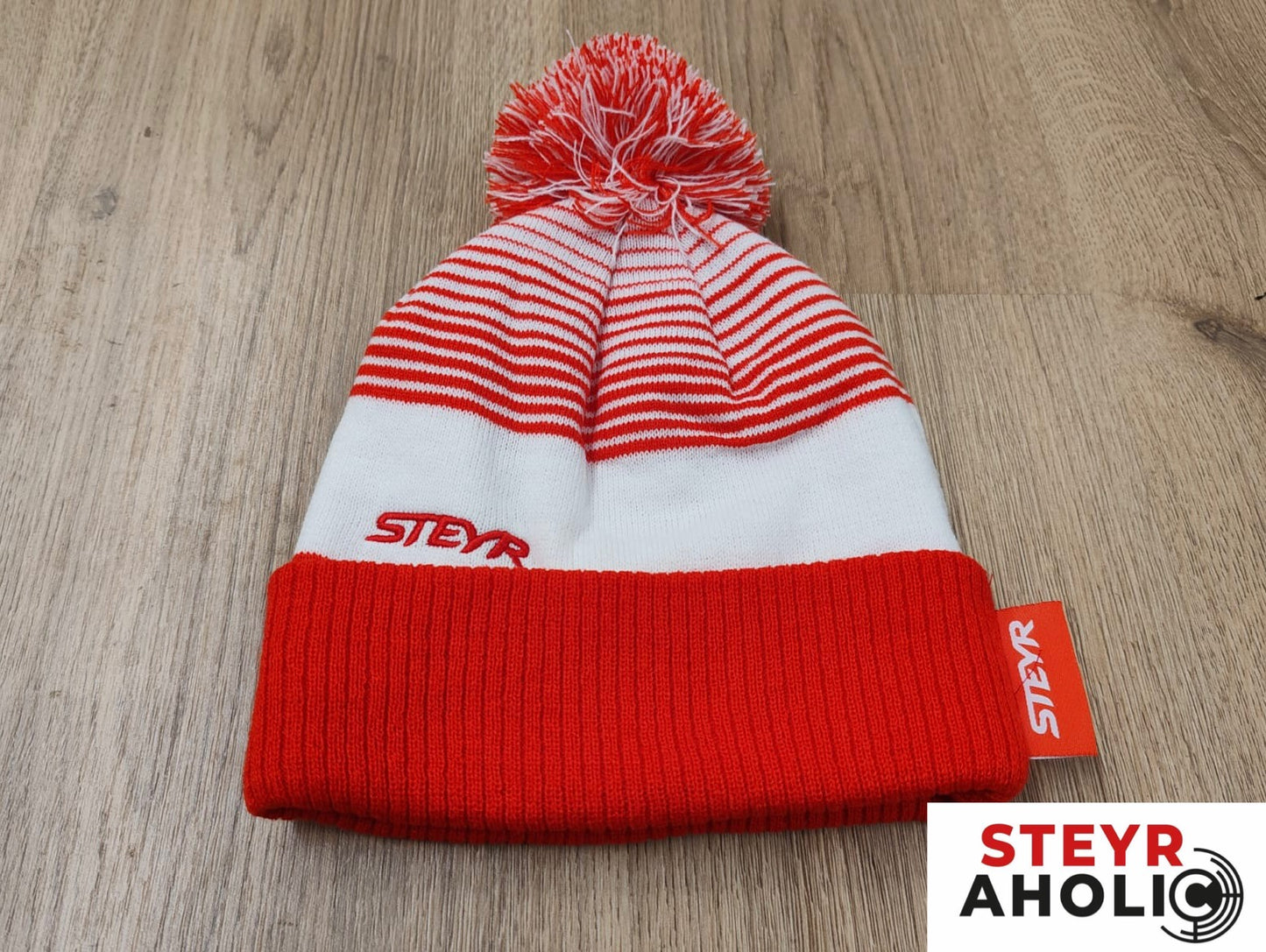 Haube Steyr "Logo neu" mit Pommel